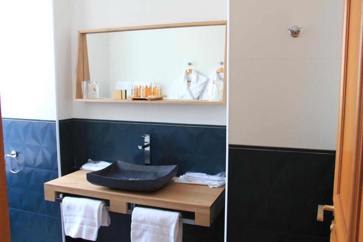 Cuisine ou kitchenette dans l'établissement Le Diana Hôtel & Spa