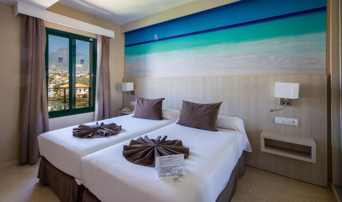 Cama o camas de una habitación en Benalmadena Palace Spa
