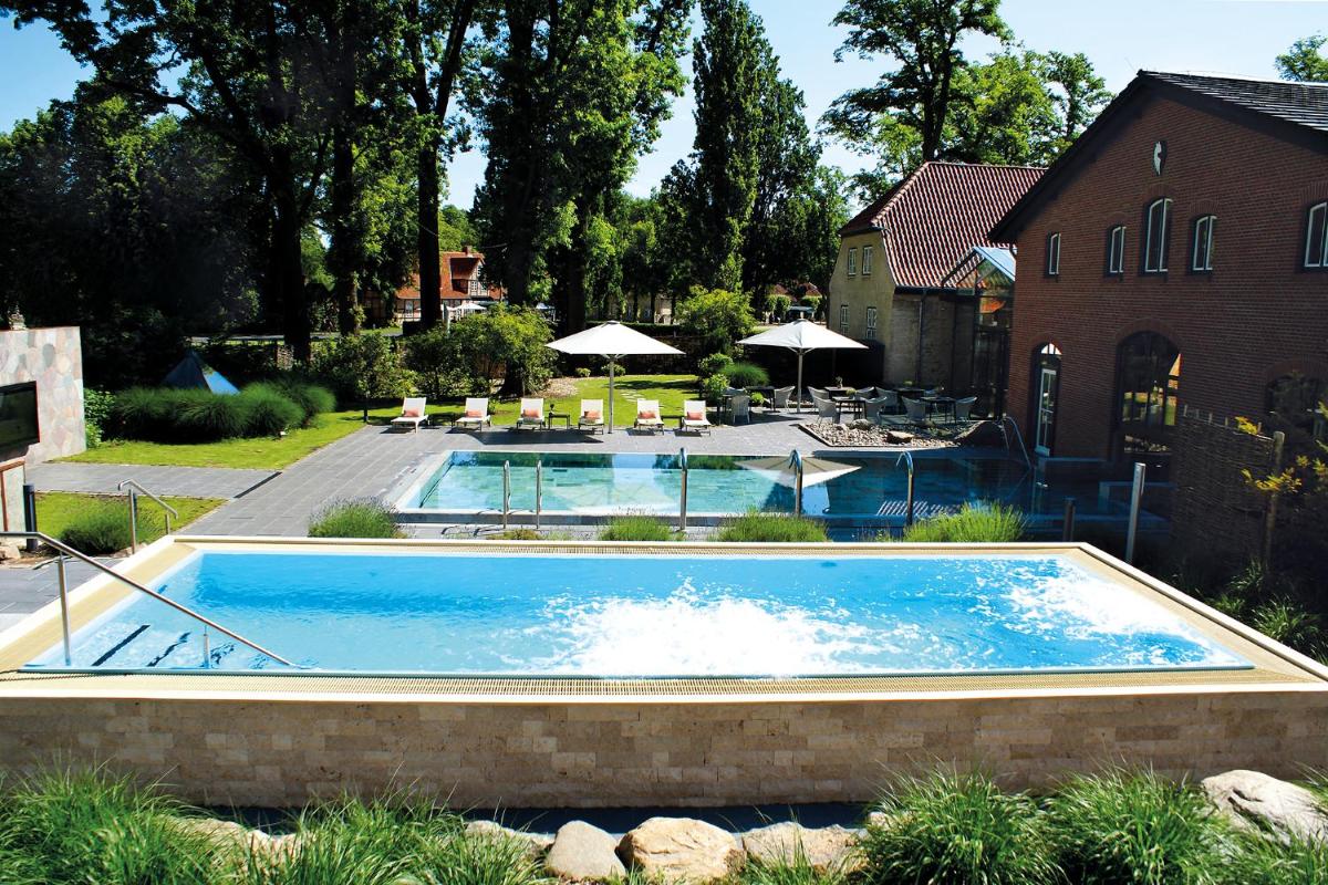 Der Swimmingpool an oder in der Nähe von Weissenhaus Private Nature Luxury Resort