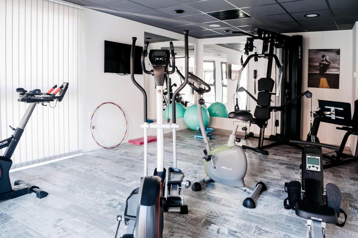 Salle ou équipements de sports de l'établissement Logis Hôtel Restaurant Au Lion Rouge