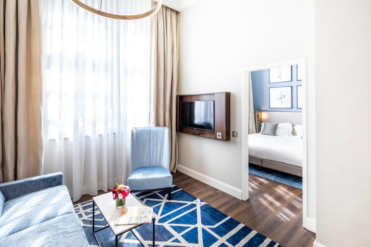 TV/Unterhaltungsangebot in der Unterkunft Fraser Suites Hamburg TV/Unterhaltungsangebot in der Unterkunft Fraser Suites Hamburg