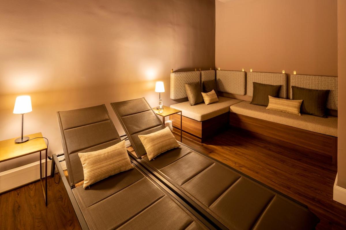 Ein Bett oder Betten in einem Zimmer der Unterkunft Fraser Suites Hamburg Ein Bett oder Betten in einem Zimmer der Unterkunft Fraser Suites Hamburg