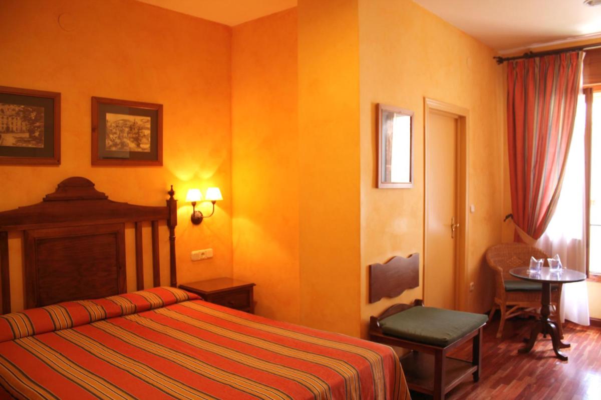 Cama o camas de una habitación en Balneario de Alhama de Granada