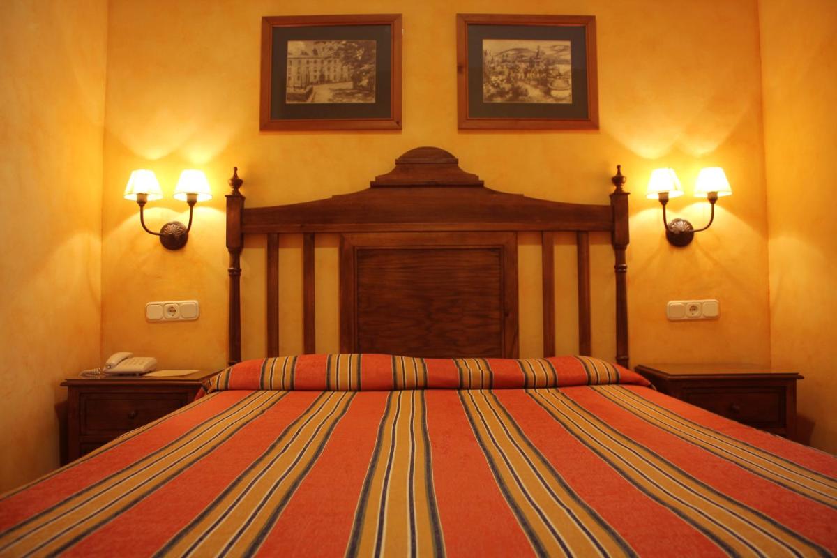 Cama o camas de una habitación en Balneario de Alhama de Granada