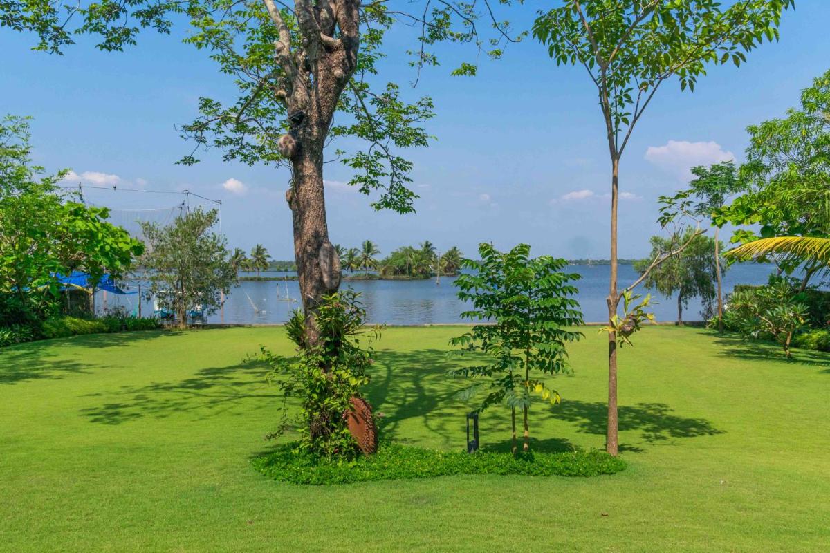 Cheppanam House with Backwater View and Pvt Lawn by StayVista - Housity