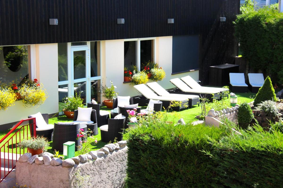 Jardin de l'établissement Hotel de la Jamagne & Spa