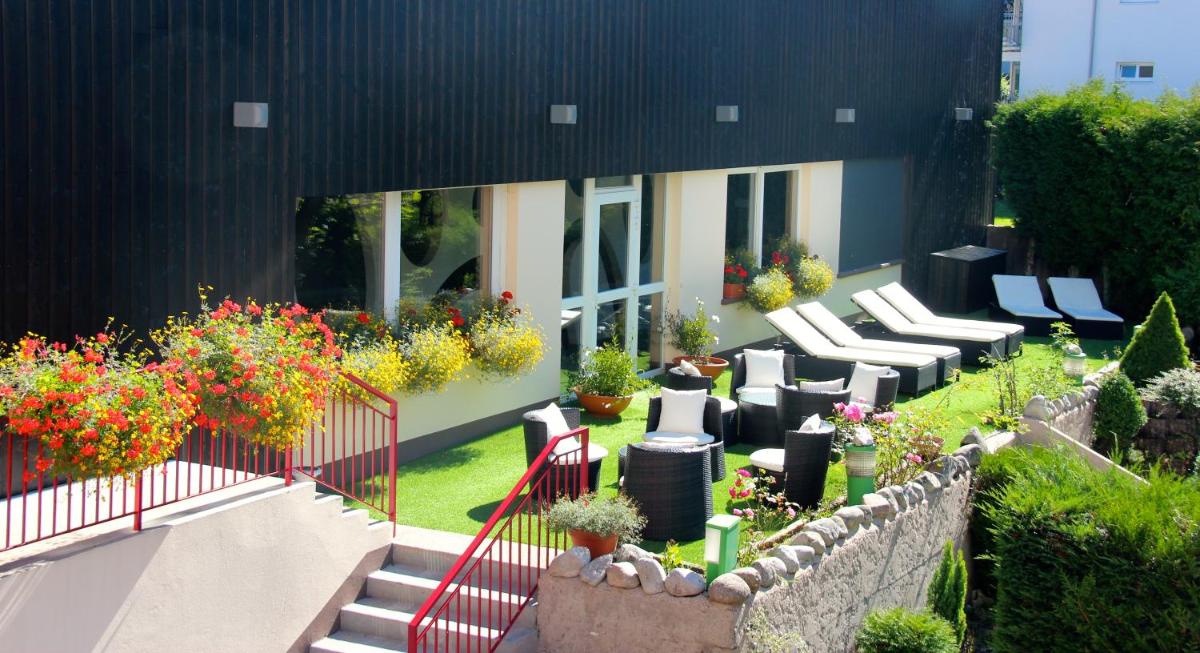Jardin de l'établissement Hotel de la Jamagne & Spa