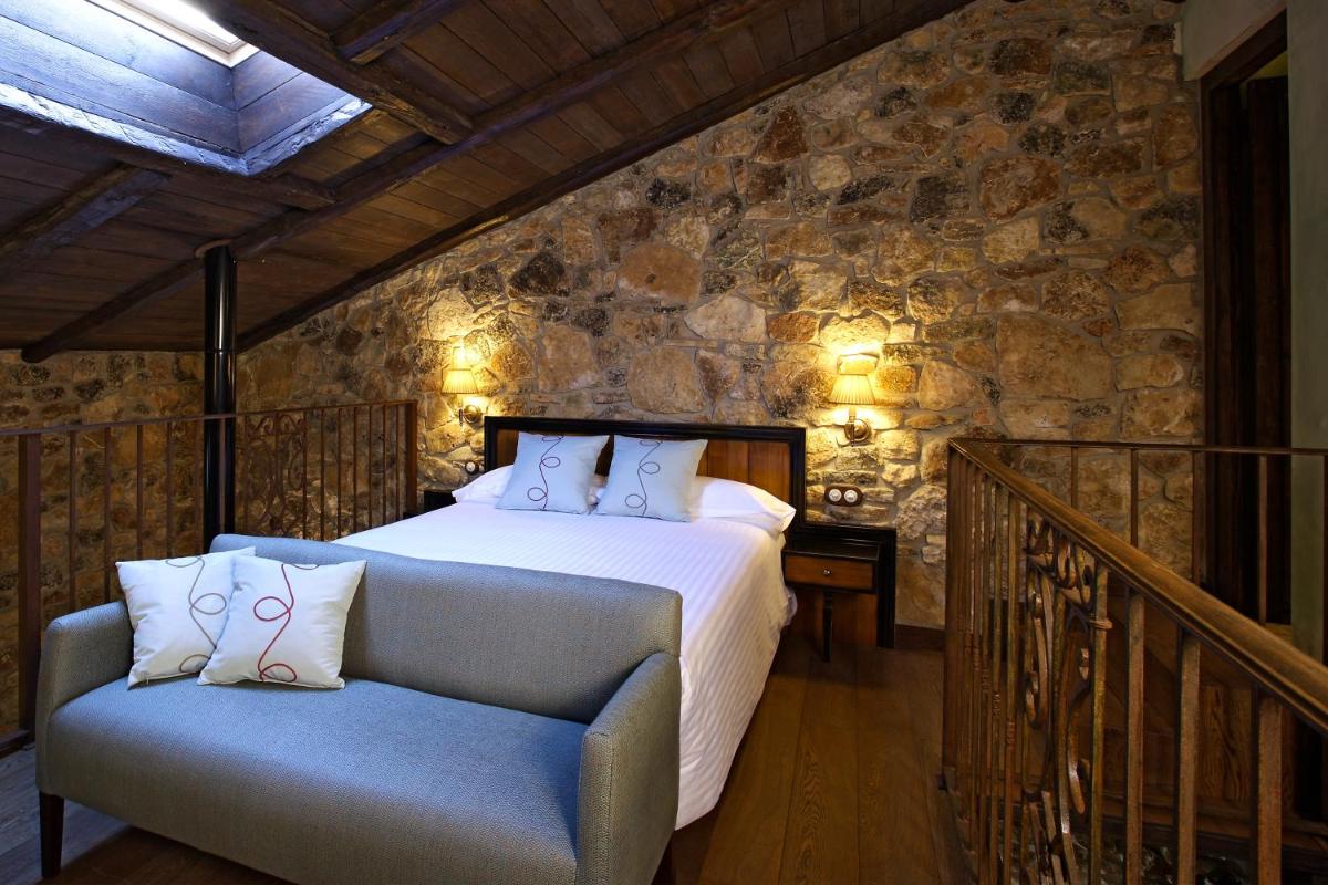 Cama o camas de una habitación en Hotel Rural & Spa Los Ánades