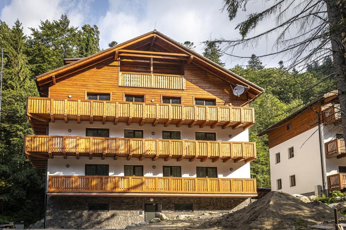 Apartmánový dom Poludnica - Chopok Juh - Housity