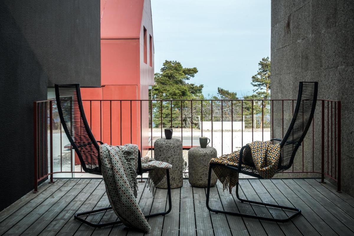 Uma área de estar em Casa das Penhas Douradas - Burel Expedition Hotel