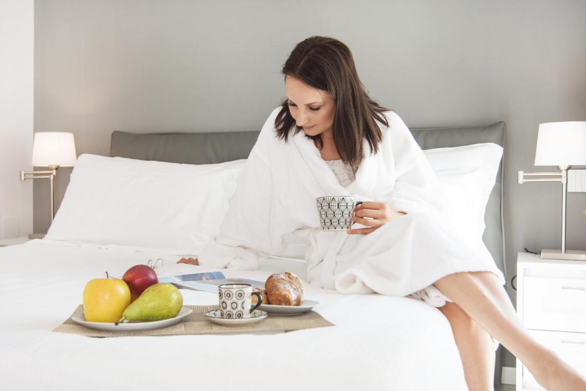 LA QUADRA SUITES - Central Apartments in Iseo - Housity