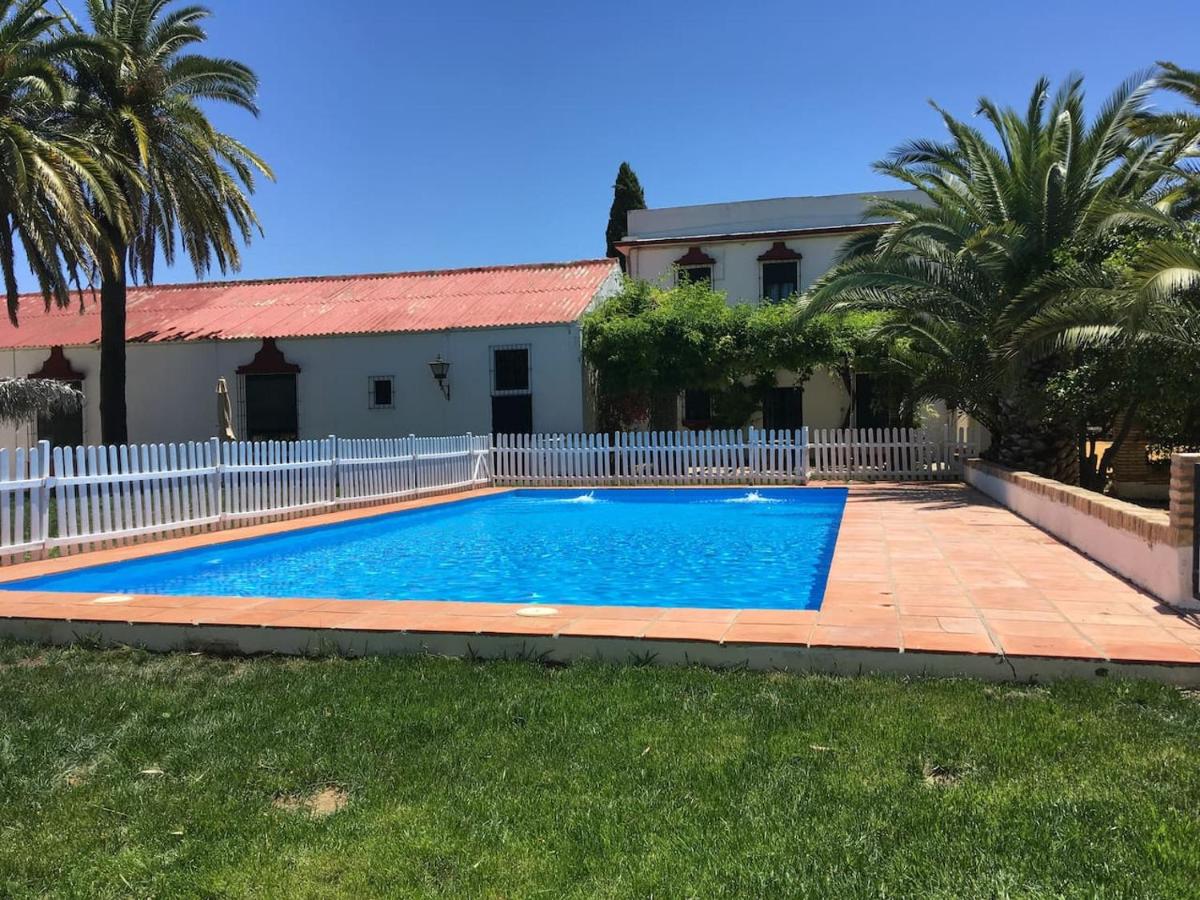 HACIENDA CHAMBERGO Casa en la campiña sevillana - Housity