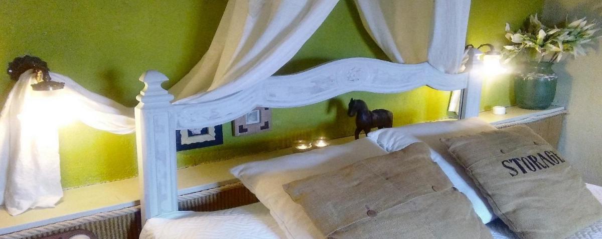 Cama o camas de una habitación en Les Vinyes Alojamiento Rural Boutique & SPA