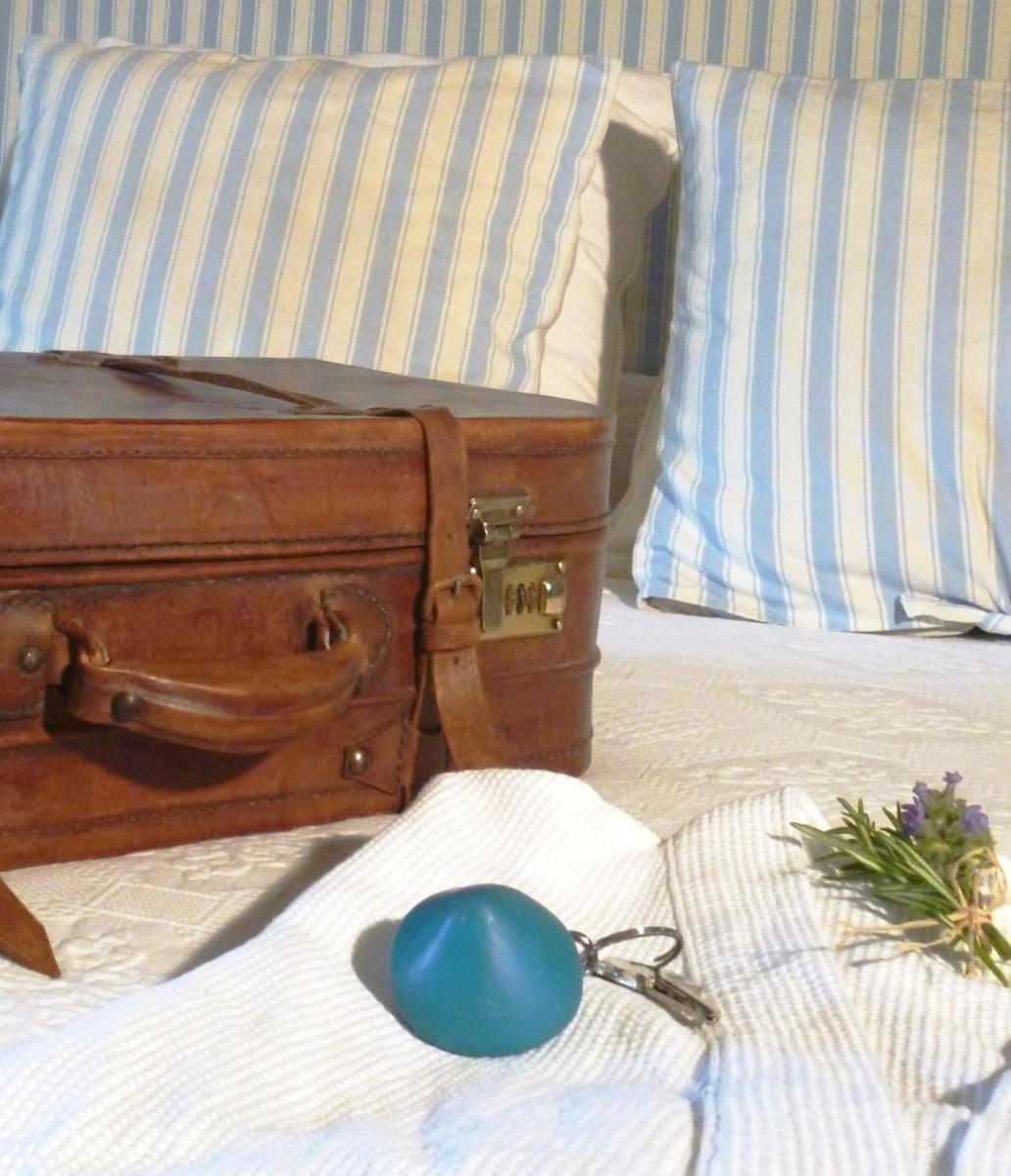 Cama o camas de una habitación en Les Vinyes Alojamiento Rural Boutique & SPA