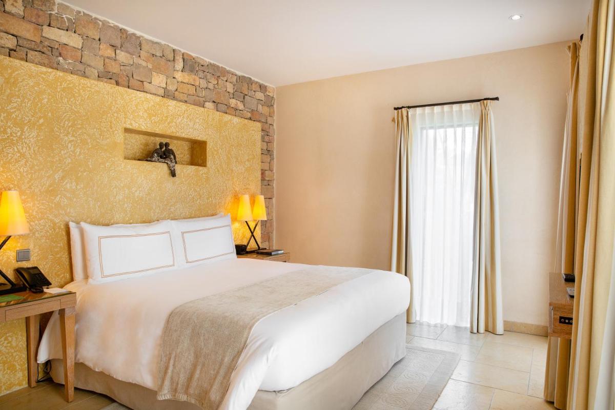 Un ou plusieurs lits dans un hébergement de l'établissement Terre Blanche Hotel Spa Golf Resort