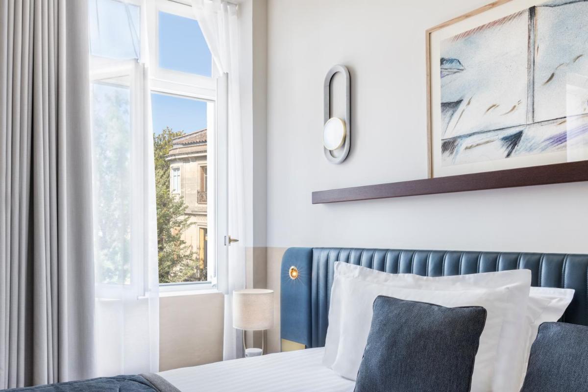Un ou plusieurs lits dans un hébergement de l'établissement Maison Albar Hotels L’Imperator