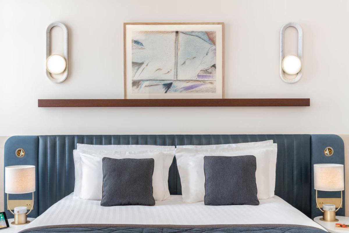 Un ou plusieurs lits dans un hébergement de l'établissement Maison Albar Hotels L’Imperator
