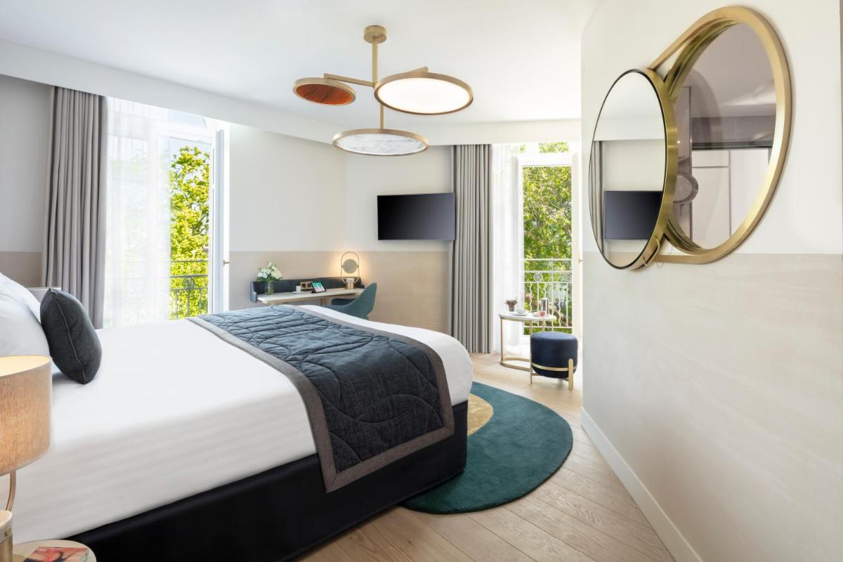 Un ou plusieurs lits dans un hébergement de l'établissement Maison Albar Hotels L’Imperator