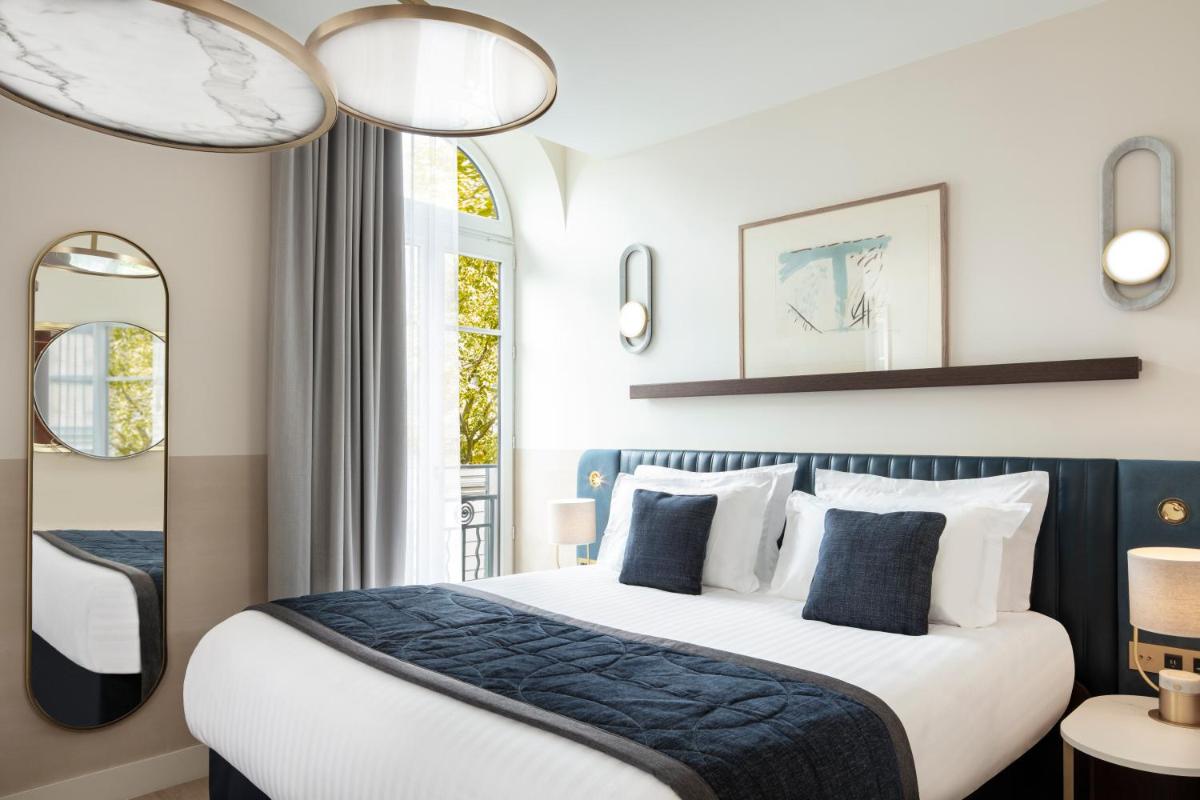 Un ou plusieurs lits dans un hébergement de l'établissement Maison Albar Hotels L’Imperator