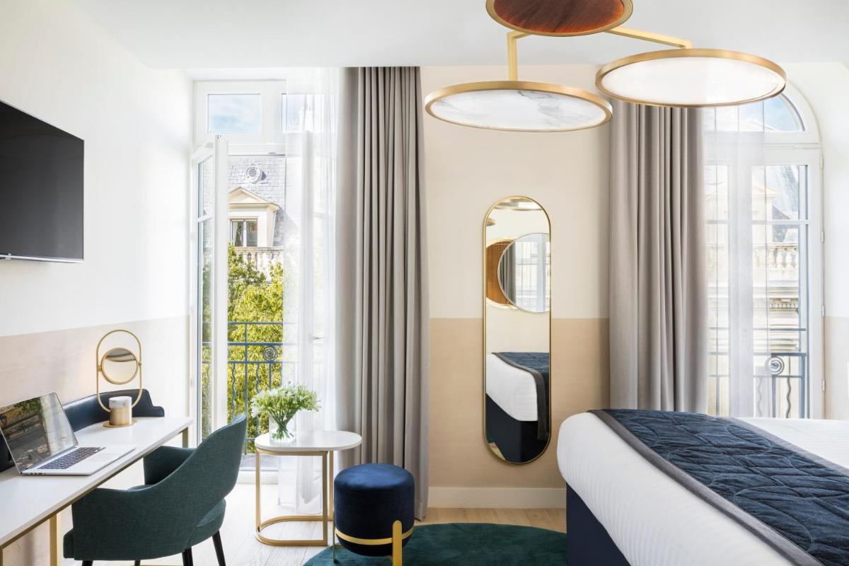 Un ou plusieurs lits dans un hébergement de l'établissement Maison Albar Hotels L’Imperator