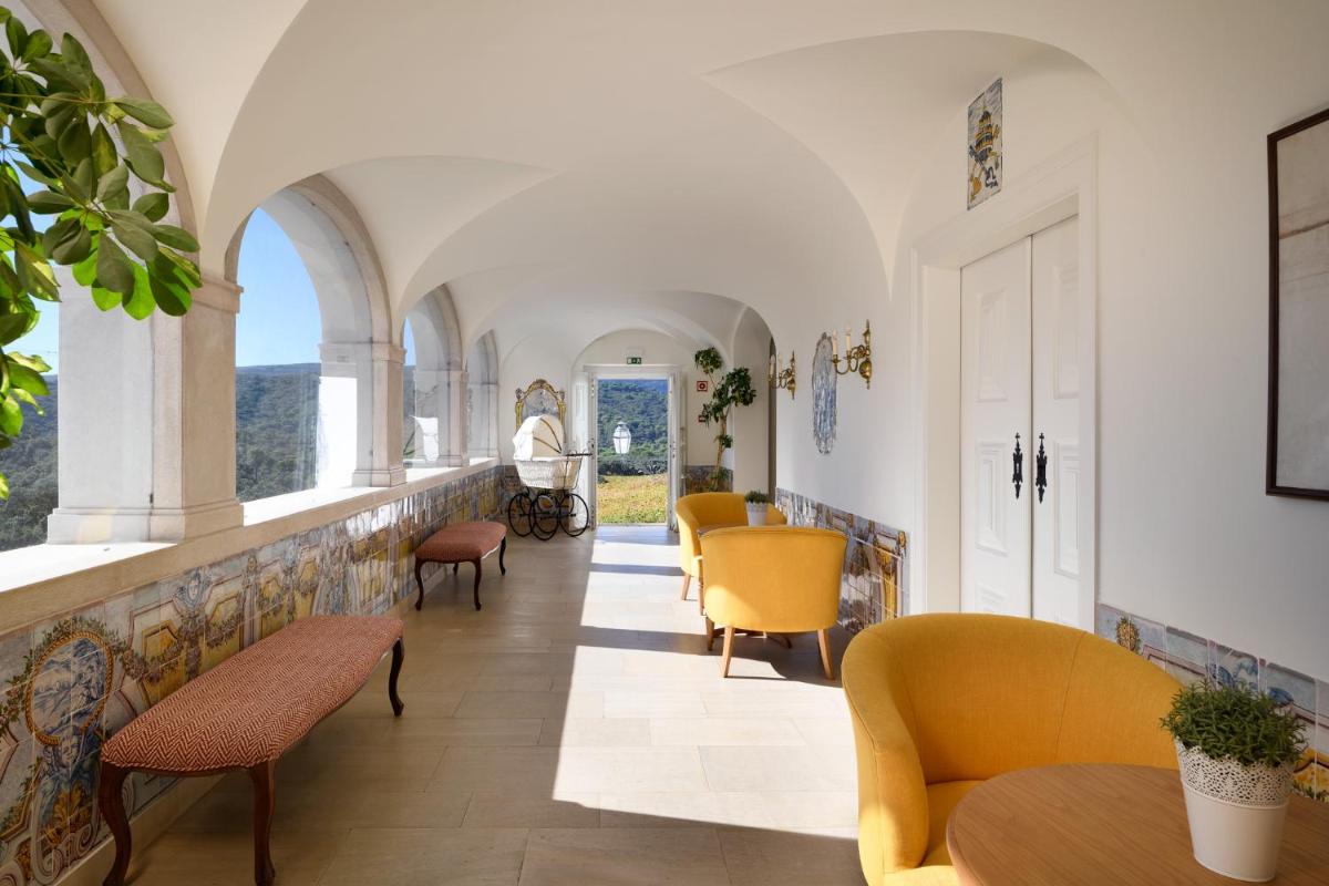 Uma área de estar em Hotel Casa Palmela - Small Luxury Hotels of The World, Hotel & Villas
