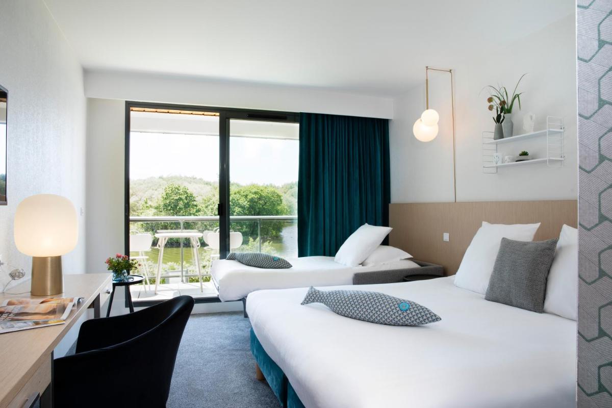 Un ou plusieurs lits dans un hébergement de l'établissement Best Western Plus Hotel les Rives du Ter