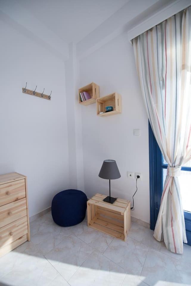 Aquarella-stylish veranda apartment in centre of Poros town - Housity