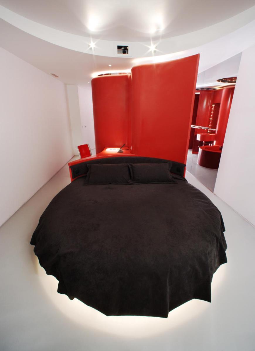 Cama o camas de una habitación en Hotel Puerta America