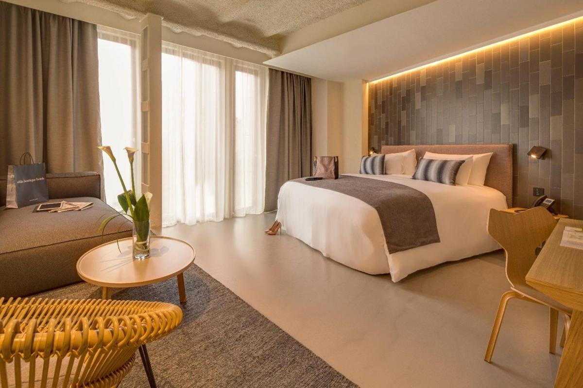 Cama o camas de una habitación en Ohla Eixample