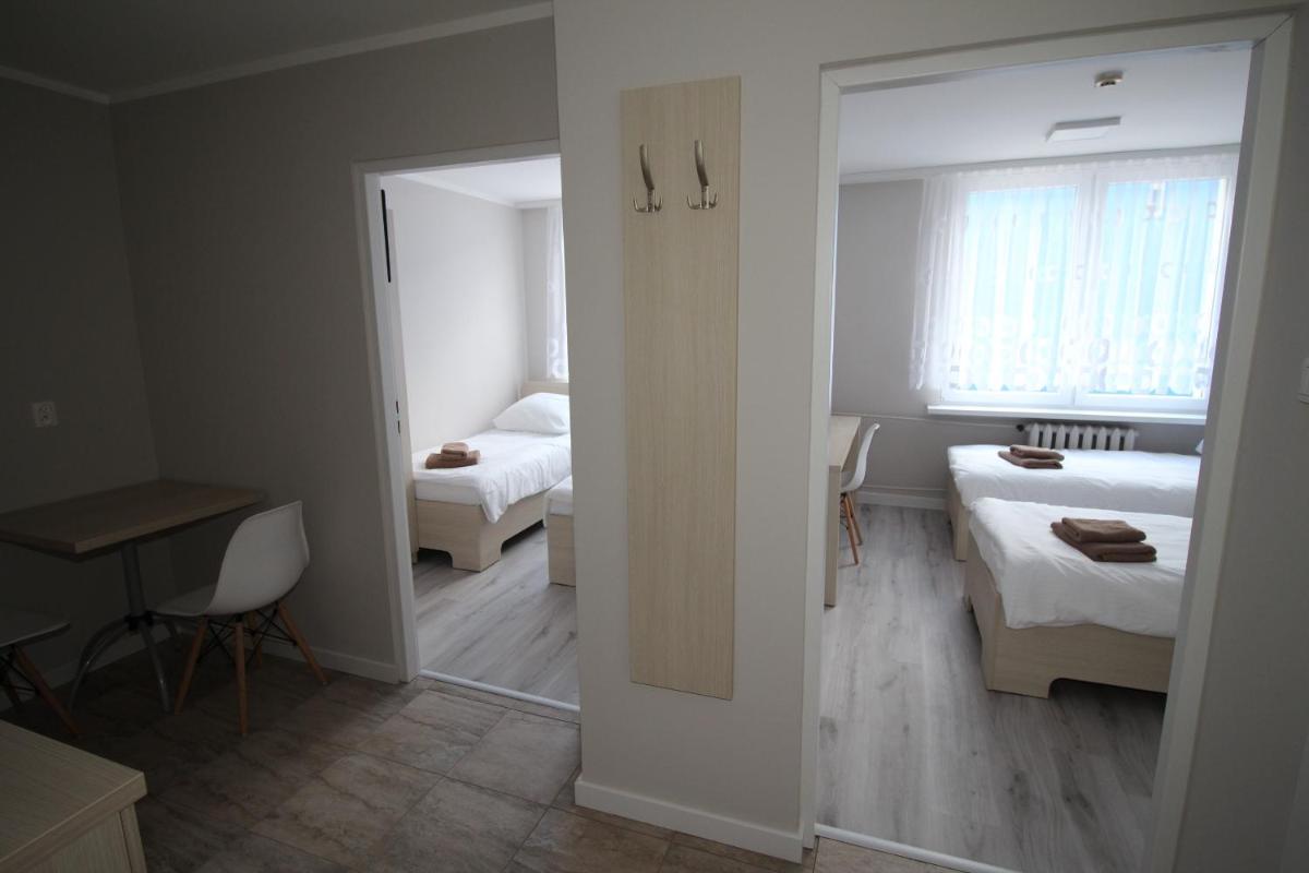 Pod Kominem Pokoje i Apartamenty - Housity