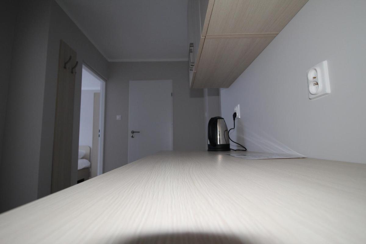 Pod Kominem Pokoje i Apartamenty - Housity