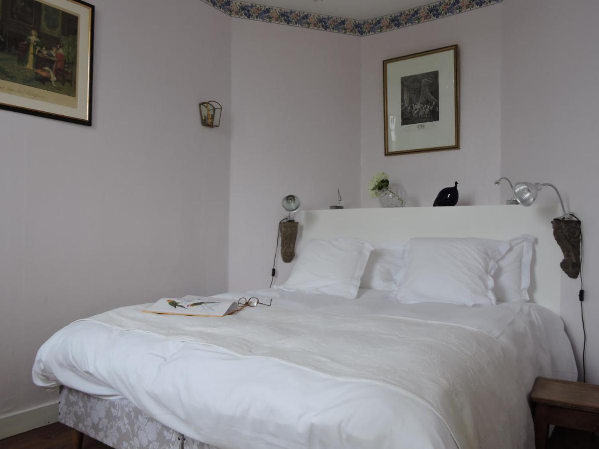 Un ou plusieurs lits dans un hébergement de l'établissement Le Domaine de Mestré, The Originals Relais