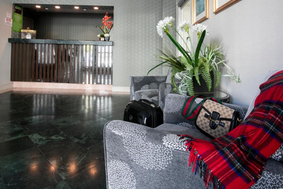 City Center Inn and Suites - Housity
