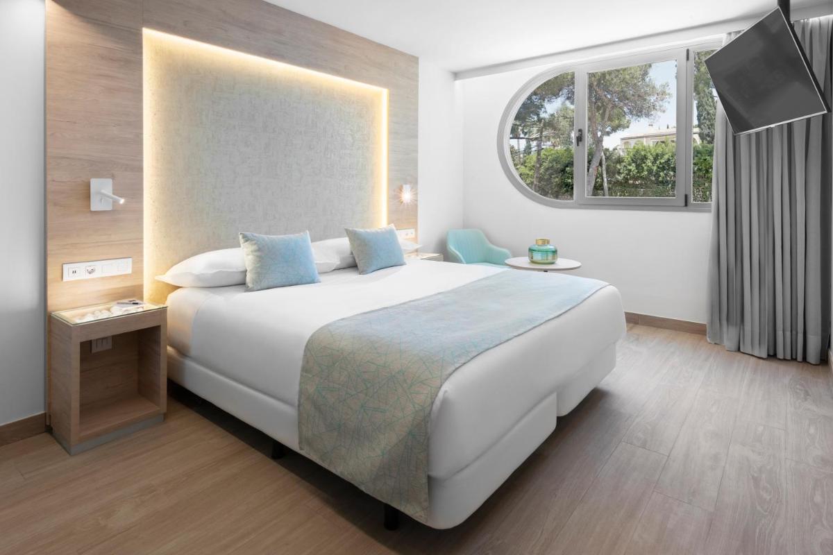 Cama o camas de una habitación en Elba Sunset Mallorca Thalasso Spa
