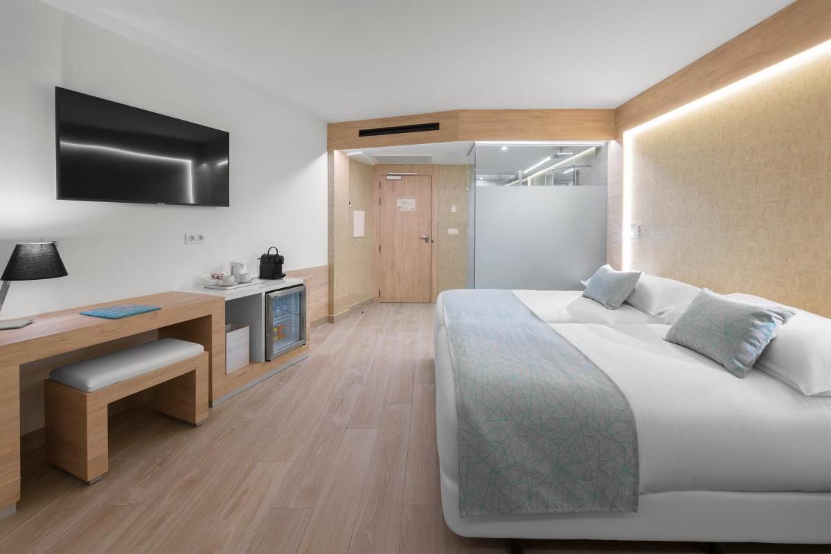 Cama o camas de una habitación en Elba Sunset Mallorca Thalasso Spa