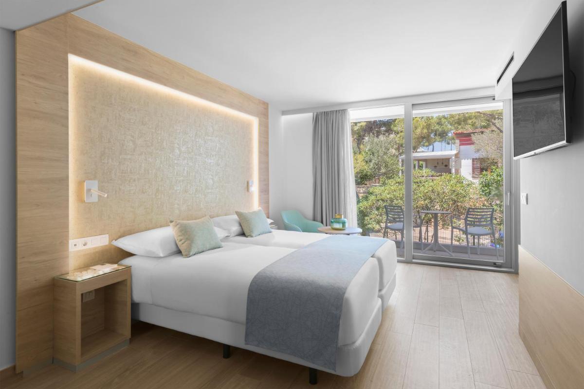 Cama o camas de una habitación en Elba Sunset Mallorca Thalasso Spa