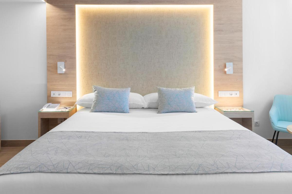 Cama o camas de una habitación en Elba Sunset Mallorca Thalasso Spa