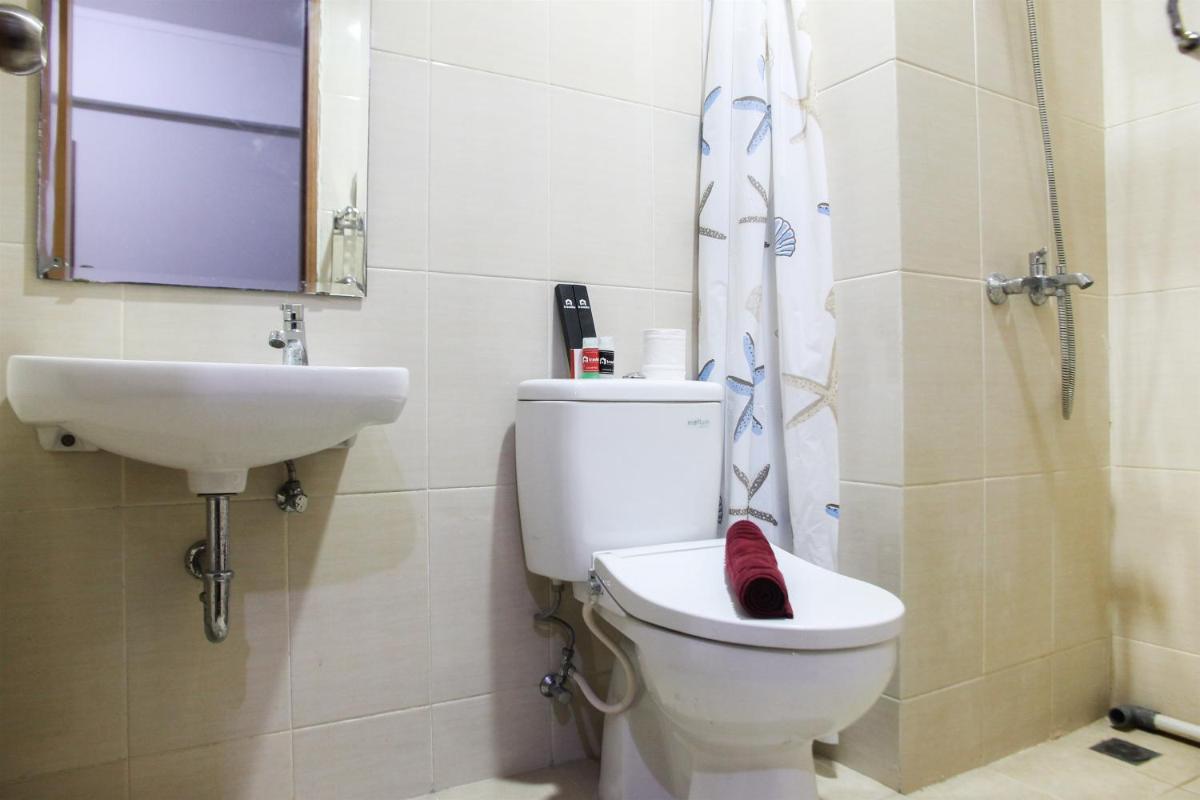 1BR with Extra Balcony The Oasis Cikarang Apartment By Travelio - Housity