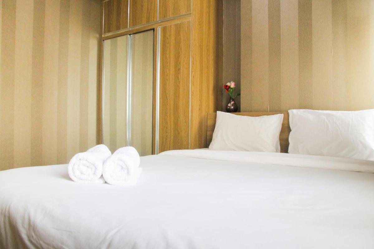 1BR with Extra Balcony The Oasis Cikarang Apartment By Travelio - Housity