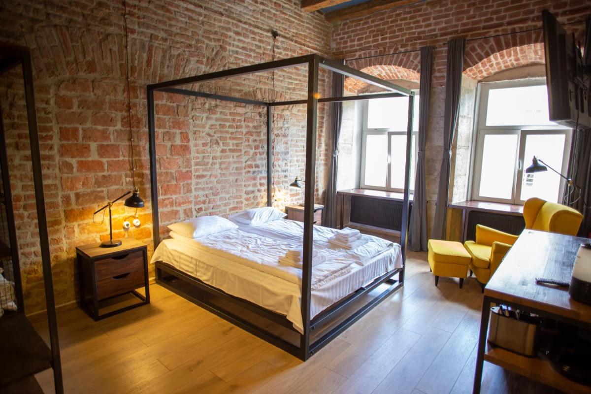 Apartments JustLvivIt at the Rynok Square - Housity