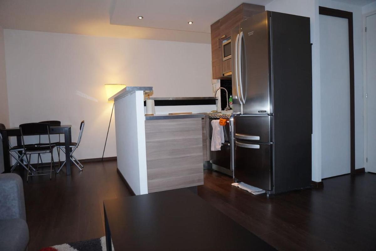 F1 de 36m2 avec terrasse et parking privatif. - Housity