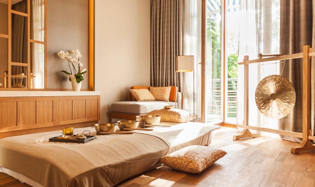 Ein Bett oder Betten in einem Zimmer der Unterkunft Althoff Seehotel Überfahrt