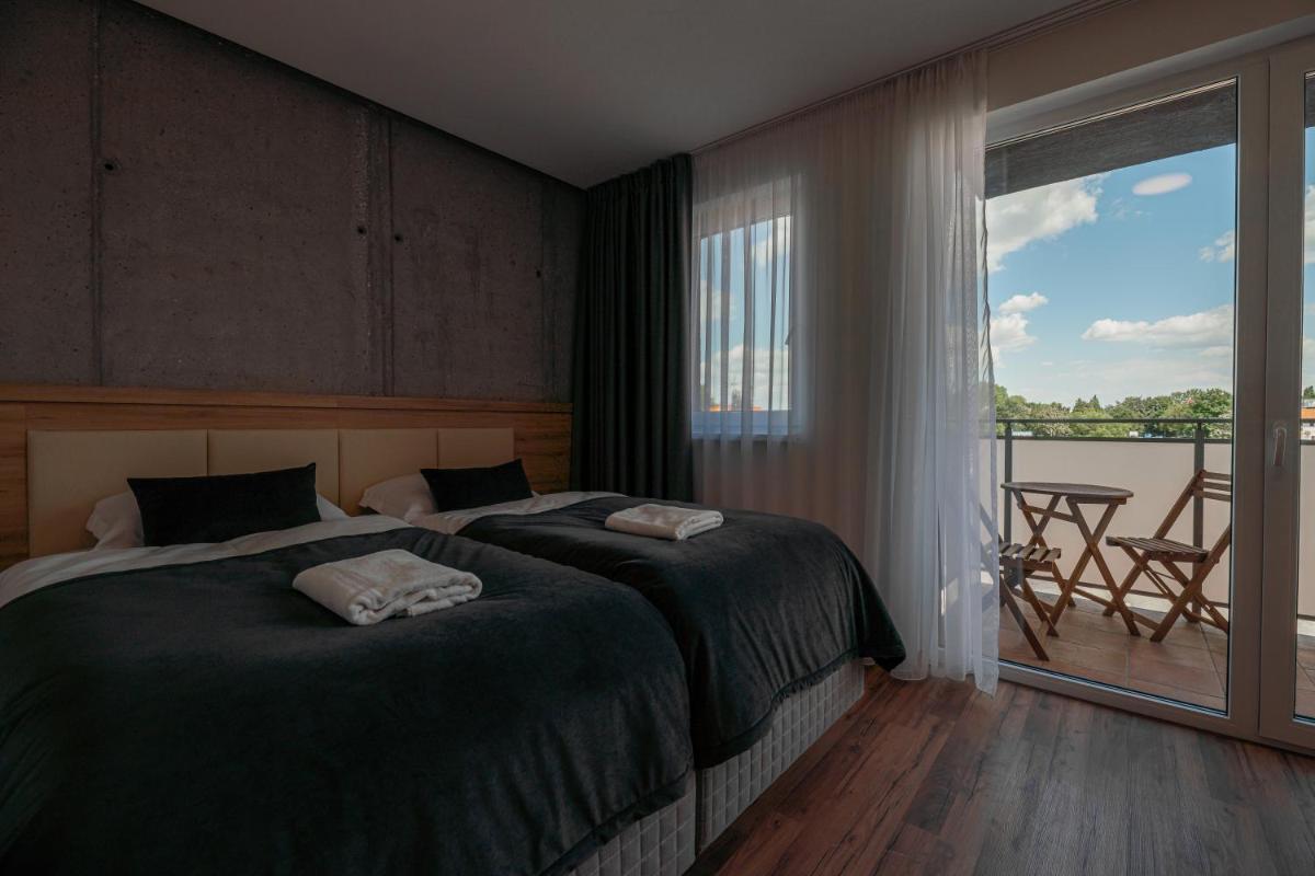 Apartmány pri vstupe do Aquaparku - Housity