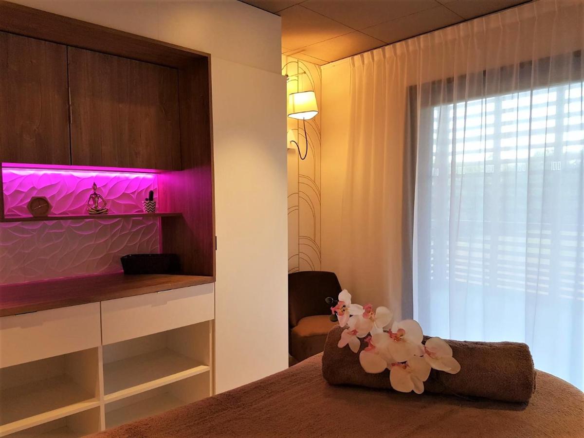 Un ou plusieurs lits dans un hébergement de l'établissement Mildiss Hotel Spa & Restaurant, BW Signature Collection