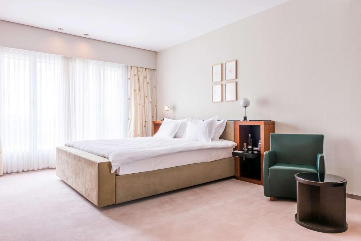 Ein Bett oder Betten in einem Zimmer der Unterkunft Grand Hyatt Berlin
