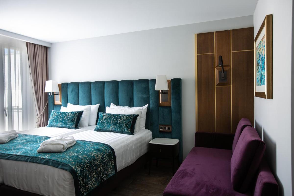 Cama o camas de una habitación en Boutique Hotel Élke Spa Superior