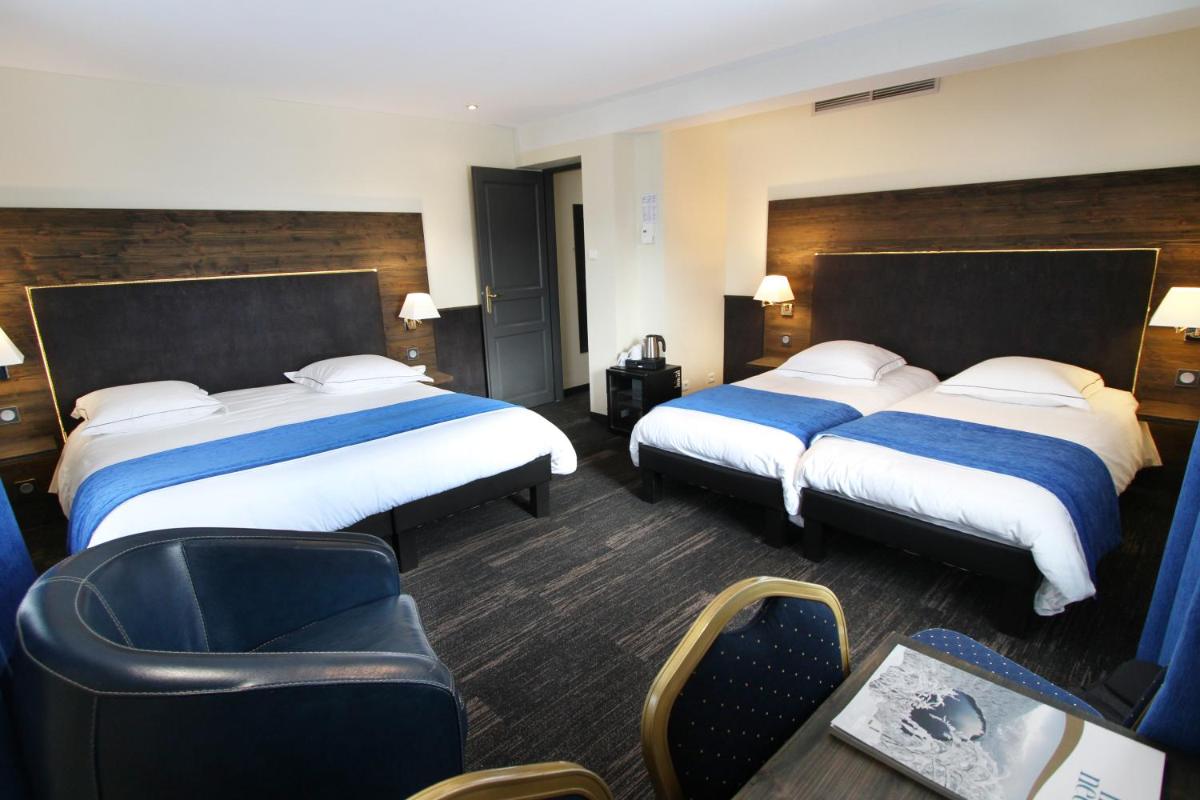 Un ou plusieurs lits dans un hébergement de l'établissement Hotel de la Jamagne & Spa