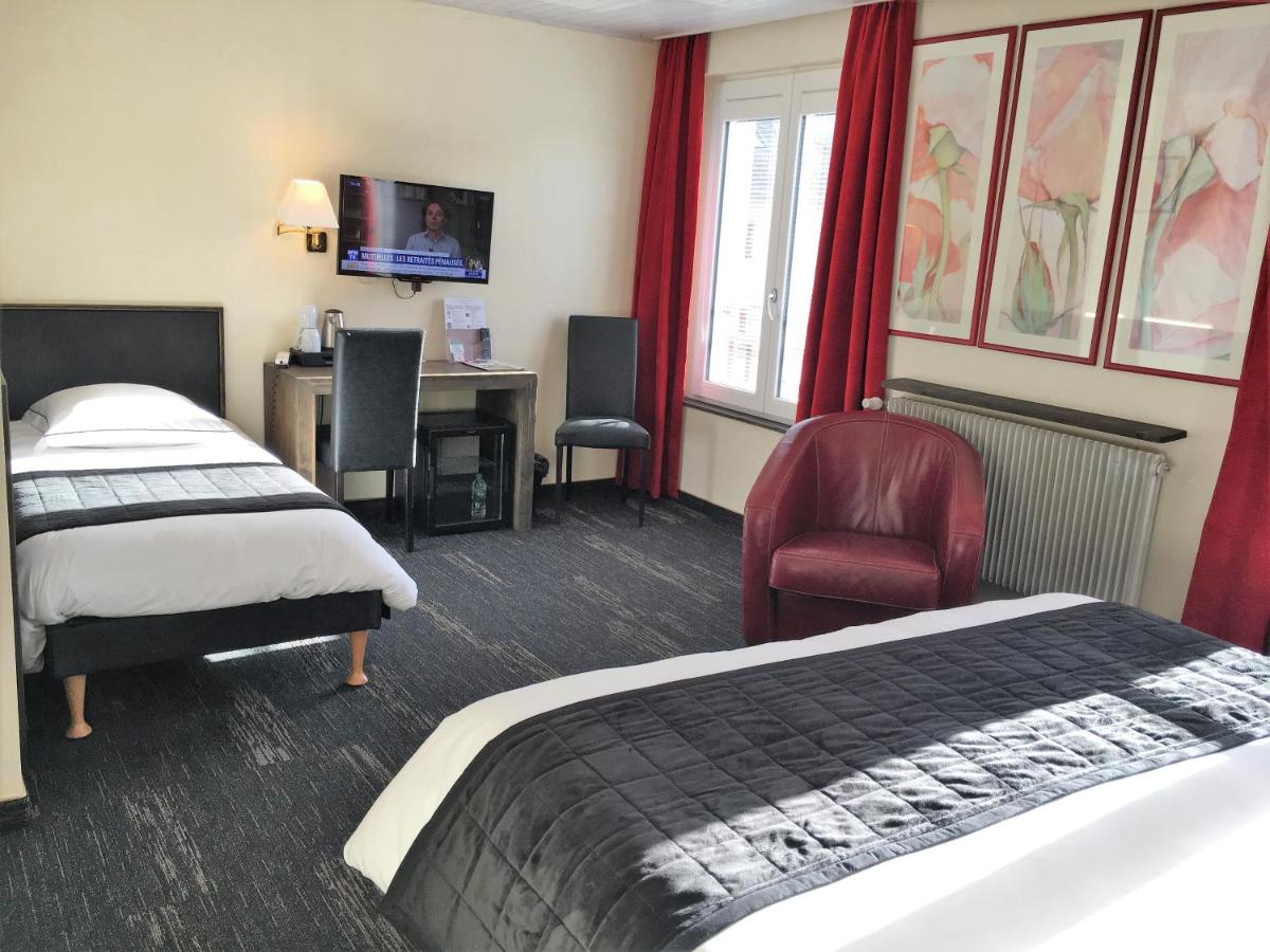 Un ou plusieurs lits dans un hébergement de l'établissement Hotel de la Jamagne & Spa