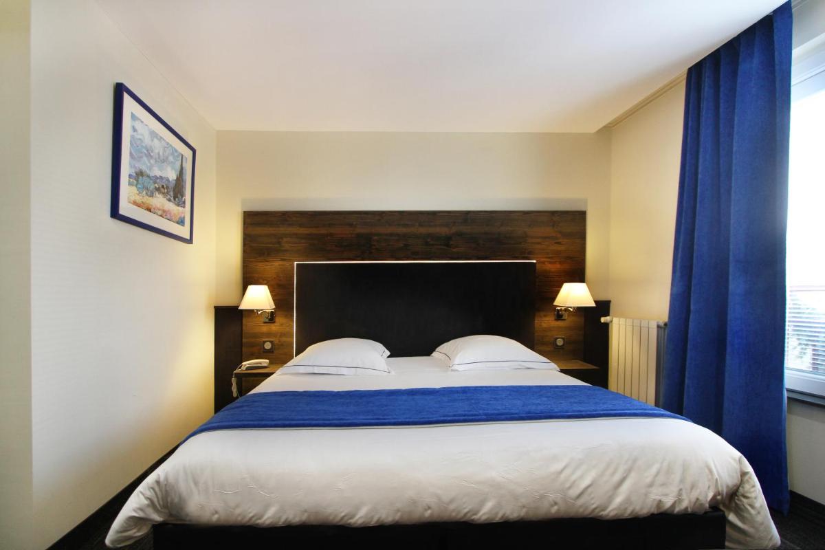 Un ou plusieurs lits dans un hébergement de l'établissement Hotel de la Jamagne & Spa
