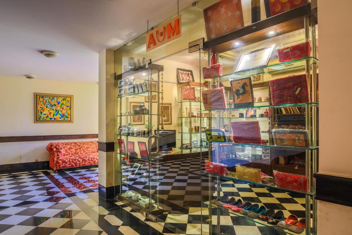 a room with a display case in a store at The Lalit Laxmi Vilas Palace in Udaipur